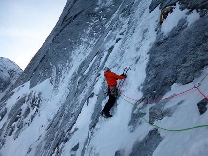 Pizzo Badile, Amore di Vetro, Marcel Schenk, Simon Gietl -  Marcel Schenk heading into the unknown during the first ascent of 'Amore di Vetro', Pizzo Badile on 16/11/2016 