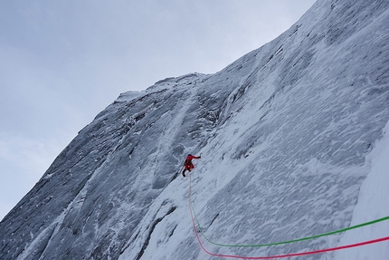 Pizzo Badile, Amore di Vetro, Marcel Schenk, Simon Gietl - Simon Gietl on the upper section of the face during the first ascent of 'Amore di Vetro', Pizzo Badile on 16/11/2016 