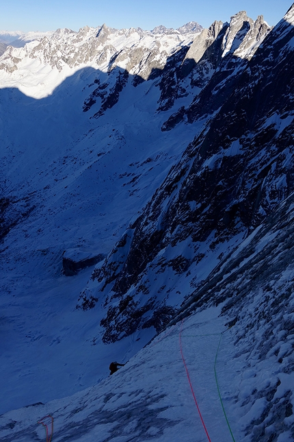 Pizzo Badile, Nordest supercombo, Marcel Schenk, David Hefti - During the first ascent of Nordest supercombo (800m, M7, R) up the NE Face of Pizzo Badile (Marcel Schenk, David Hefti 16/12/2016)