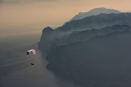 Red Bull X-Alps 2017 - Christian Maurer flying above Lake Garda during the Red Bull X-Alps 2017