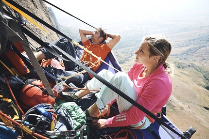 Sasha DiGiulian, Tsaranoro Atsimo, Madagascar - Sasha DiGiulian and Edu Marin resting on a portaledge on Mora Mora (5.14b, 8c), Tsaranoro, Madagascar