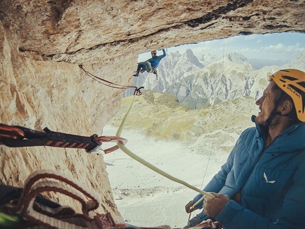 Cima Ovest di Lavaredo, Tre Cime di Lavaredo, Dolomites - Jacek Matuszek belayed by Łukasz Dudek climbing the crux pitch of Project Fear on Cima Ovest di Lavaredo, Dolomites (08/2017)