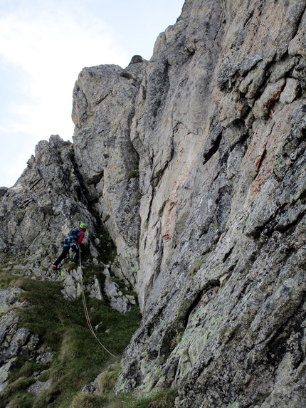 Val Torrone, Val Masino, Via Napoleone,  Manuele Panzeri, Giovanni Giarletta - Giovanni Giarletta climbing pitch 8, in the chimney that leads to the top of Via Napoleone in Val Torrone (Val Masino)