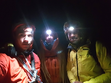 Grand Capucin, Mont Blanc, L'or du temps, Pavel Kratochvíl, Róbert Luby, Martin Krasňanský - The hands of Pavel Kratochvíl, Róbert Luby and Martin Krasňanský abseiling into the night after having made the first free ascent of 'L'or du temps', Grand Capucin, Mont Blanc