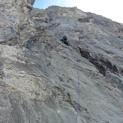 Brette Harrington, Rose Pearson, Life Compass, Mount Blane, Canada - Brette Harrington climbing rocky terrain during the first ascent of Life Compass, Mount Blane, Canada, with Rose Pearson