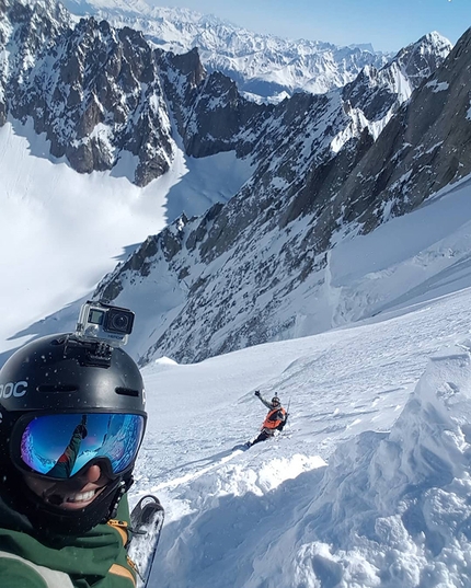 Jonathan Charlet, Christophe Henry, Triolet, Mont Blanc - Jonathan Charlet and Christophe Henry skiing and snowboarding down the North Face of Triolet