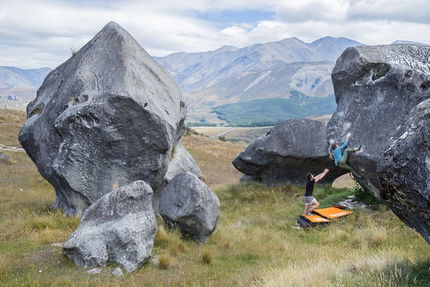 Charlotte Durif, Josh Larson, A World Less Traveled - Charlotte Durif and Josh Larson bouldering at Flock Hill, New Zealand.