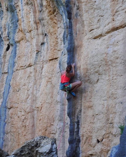 Ikaria Island, Greece, climbing - Ikaria Island: Argyro Papathanasiou making the first ascent of Asprodontis