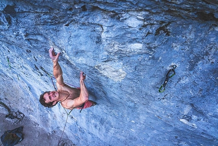 Adam Ondra - Adam Ondra making an onsight ascent of the 8c+ First Flight at Acephale in Canada