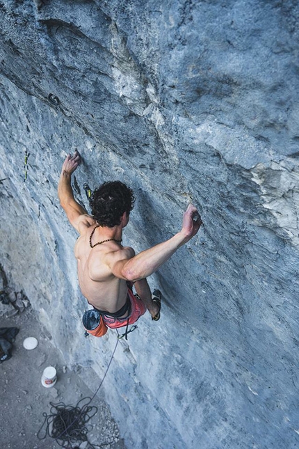 Adam Ondra - Adam Ondra making an onsight ascent of the 8c+ First Flight at Acephale in Canada