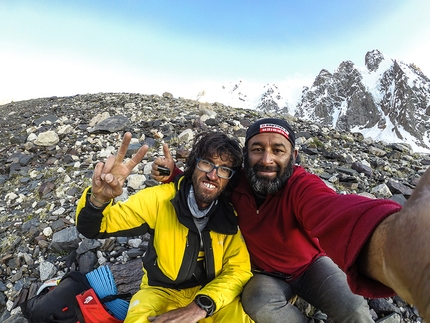 Hansjörg Auer, Lupghar Sar Solo Expedition - Hansjörg Auerand his cook celebrating after having made the solo first ascent of the West Face of Lupghar Sar West, Karakorum, Pakistan