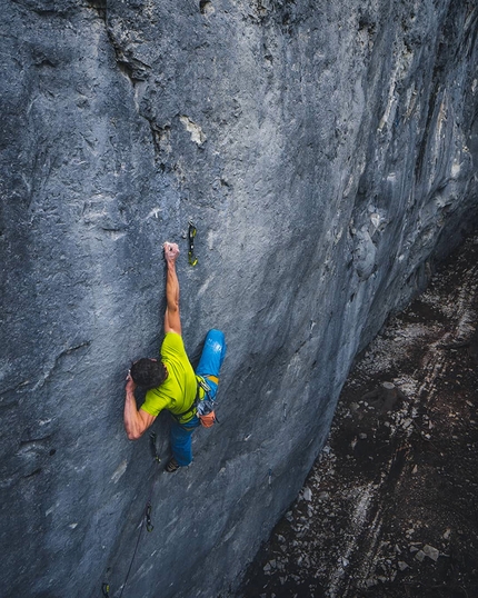 Adam Ondra Disbelief, Canada - Adam Ondra on the crux move of the 9b slab Disbelief at Acephale in Canada.