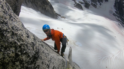 Florian Riegler, Martin Riegler, The Flying Penguin, Bugaboos, Canada - Martin Riegler seconding pitch 1 during first free ascent of The Flying Penguin, Bugaboos, Canada