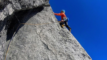 Florian Riegler, Martin Riegler, The Flying Penguin, Bugaboos, Canada - Martin Riegler climbing pitch 4 during the first free ascent of The Flying Penguin, Bugaboos, Canada