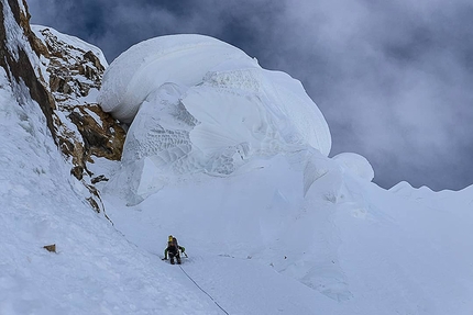 Latok I, Karakorum, Pakistan, Aleš Česen, Luka Stražar, Tom Livingstone - Latok I: 'Two pitches below the west col on Latok I. The snow mushroom above us looked already scary from the base camp, and not much more friendly when we passed it on mixed ground on the left'