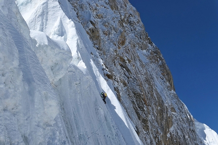 Latok I, Karakorum, Pakistan, Aleš Česen, Luka Stražar, Tom Livingstone - Luka Stražar in the middle part of the North Ridge of Latok I, traversing below some snow mushrooms to make a way to the upper part.