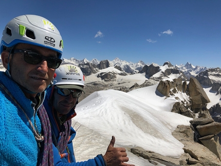 Kiris Peak, Karakorum, Pakistan - Maurizio Giordani and Massimo Faletti on the summit of Kiris Peak after having made the first ascent of Water World