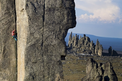 Sundrun Pillars Siberia, Kilian Fischhuber, Robert Leistner, Galya Terenteva - Galya Terenteva climbing one of the Sundrun Pillars in Siberia, June 2018.