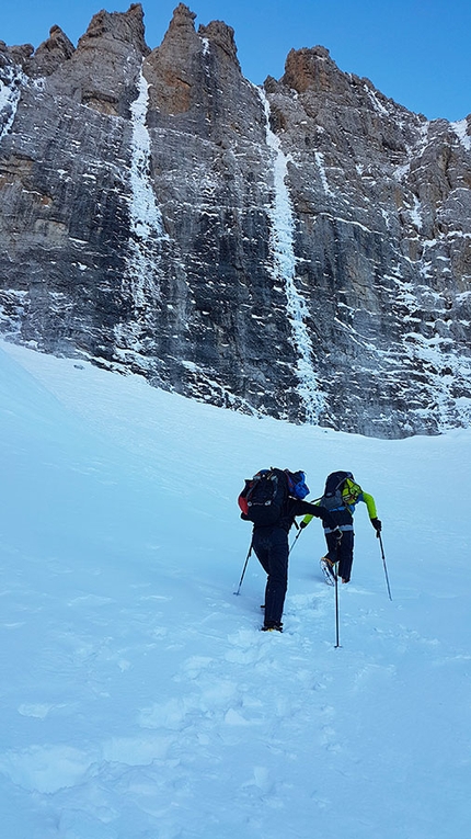 Brenta Dolomites, Cima d'Ambiez, Gianni Canale, Demis Lorenzi, Aldo Mazzotti - Demis Lorenzi and Aldo Mazzotti approaching Cima d'Ambiez in the Brenta Dolomites prior to making the first ascent of Filo d'Ambiez with Gianni Canale on 14/12/2018