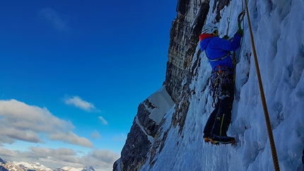 Pelmo Dolomites, Pelmoon, Enrico Geremia, Fabrizio della Rossa, Daniele Geremia - Pelmoon, Pelmo, Dolomites: Daniele Geremia climbing the second hard pitch