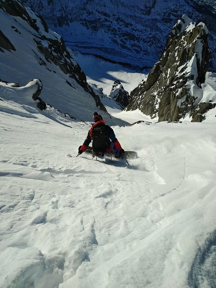 Les Drus, Mont Blanc , Julien Herry, Laurent Bibollet - Julien Herry snowboarding down the Triple Couloir on Les Drus