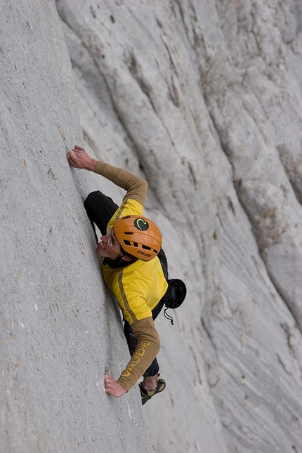 Hansjörg Auer, Fish Route, Marmolada, Dolomites - Hansjörg Auer free solo climbing the Fish route, Marmolada, 2007. A week after his ropeless ascent the Austrian returned with his brother Matthias and the photographer Heiko Wilhelm to shoot this photo.
