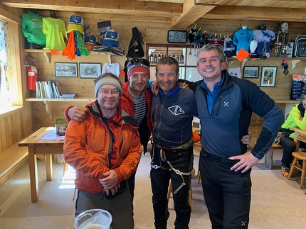 Aiguilles Marbrées Montt Blanc, Ezio Marlier, Luigi Santini, Jonathan Bracey, David Horwood - Group photo at the Torino hut after the first ascent of Mtbness, a new mixed climb up Aiguilles Marbrées, Mont Blanc: David Horwood, Jonathan Bracey, Ezio Marlier, Luigi Santini