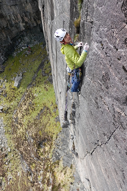 Dave MacLeod - Japanese climber Keita Kurakami climbing at Creag Mo, Isle of Harris, Scotland