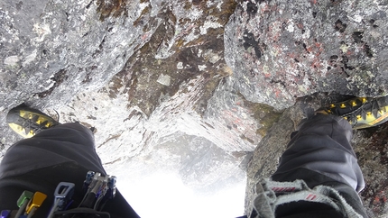 Tomas Franchini, Lamo She China - Tomas Franchini climbing through the rocky barrier during his solo ascent of the East Face of Lamo She, 14/05/2019