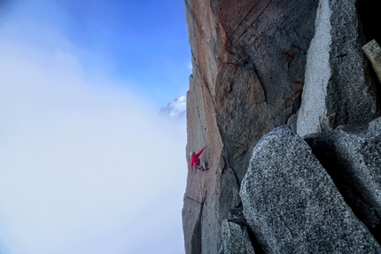 Lucie Hrozová - Lucie Hrozová climbing Digital Crack above the Arête des Cosmiques in the Mont Blanc massif.