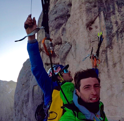 Marmolada Dolomites, Aaron Durogati, Mirco Grasso - Aaron Durogati and Mirco Grasso flying past the South Face of Marmolada in the Dolomites after having taken off from the ledge at half-height