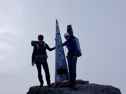 Pizzo Badile - David Hefti and Marcel Schenk on the summit of Pizzo Badile after having climbed Free Nardella
