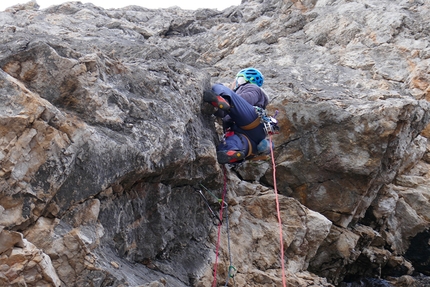 Campanile Basso, Brenta Dolomites, Alessandro Beber, Gianni Canale, Matteo Faletti - Gianni Canale dealing with the crux on pitch 2 of Destràni, Campanile Basso, Brenta Dolomites