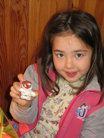 Zalia Rakhmetov - Zalia Rakhmetov with a snowman she built on her own