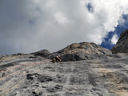 Alex Huber, Wilder Kaiser - Guido Unterwurzacher climbing pitch 2 of Koasabluad on Wilder Kaiser, Austria, first ascended with Alex Huber