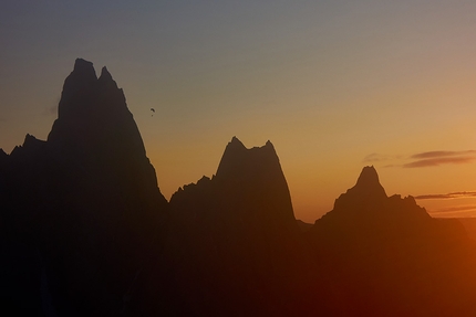 Fabian Buhl Cerro Torre paraglider - Fabian Buhl paragliding off the summit of Cerro Torre in Patagonia early on 7 February 2020. The 29-year-old is the first to do so after reaching the summit by his own means.