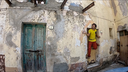 Rock climbing at Lula in Sardinia - Filippo Manca playing around during the street boulder event at Lula, Sardinia