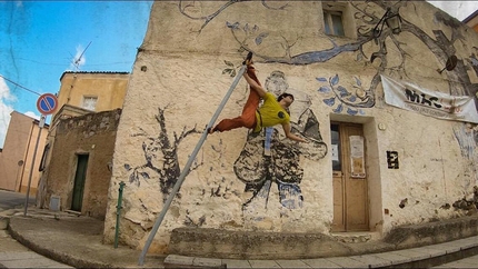 Rock climbing at Lula in Sardinia - Filippo Manca playing around during the street boulder event at Lula, Sardinia