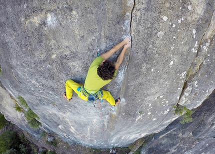 Rock climbing at Lula in Sardinia - Filippo Manca climbing Bulluzu 7c/+, sector Uselia at Lula in Sardinia