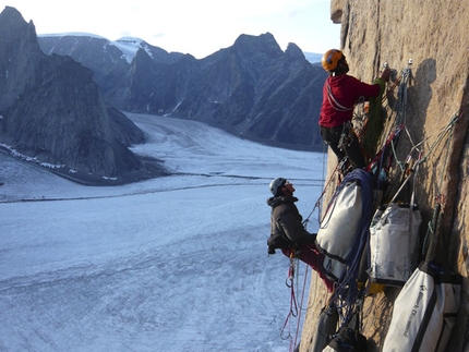 Baffin Island Mount Asgard - Mt. Asgard Baffin Island: Olivier Favresse and Sean Villanueva take a break from hauling on Mt. Asgard