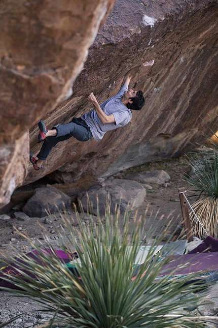 Paul Robinson - Paul Robinson making the first ascent of Karoshi V15/8C at Hueco Tanks, USA