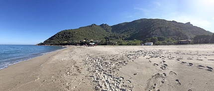 Monte Arista, Sardinia, Black Lives Matter, Simone Desogus, Maurizio Oviglia - The beach Perda ‘e Pera in Sardinia and, on the right, Monte Arista.