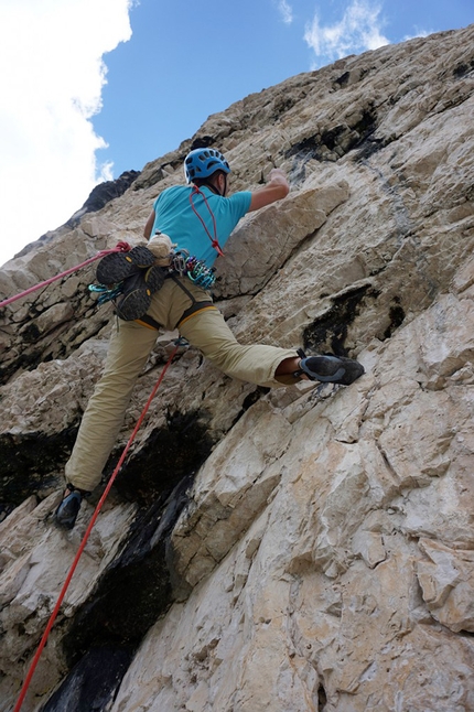 Rienzwand, Rienztal, Dolomites, Peter Manhartsberger, Martin Wibmer - Peter Manhartsberger starting up the crux pitch of Osttiroler Marende on Rienzwand, Rienztal, Dolomites