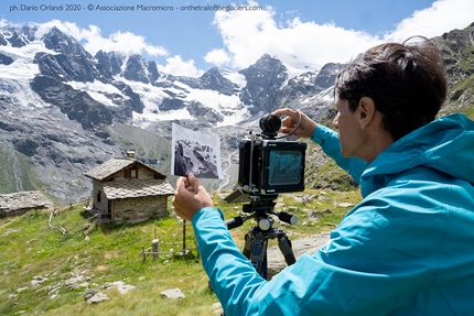 Sulle tracce dei ghiacciai, Fabiano Ventura - Sulle tracce dei ghiacciai - Alpi 2020: Fabiano Ventura durante la ripetizione di uno scatto di Vittorio Sella del 1894 del ghiacciaio del Money visto dai Casolari Herbetet, con il supporto di Daniele Cat Berro (Società Meteorologica Italiana). Sullo sfondo l’alta Valnontey con i ghiacciai (da sinistra) Money, Gran Croux, Tribolazione.