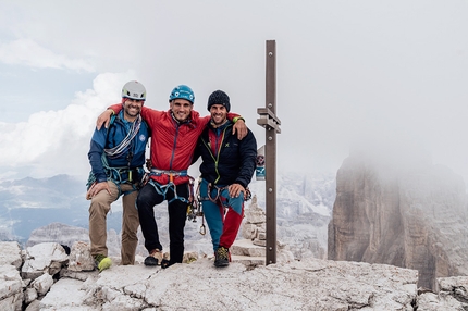 Tre Cime di Lavaredo, Dolomites, Space Vertigo - Nicola Tondini, Alessandro Baù and Claudio Migliorini on the summit of Cima Ovest di Lavaredo, Dolomites after having freed each pitch of Space Vertigo