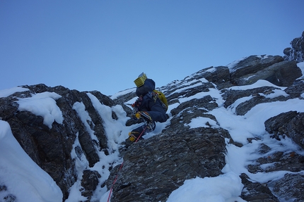 Mount Robson, Emperor Face, Canada, Ethan Berman, Uisdean Hawthorn - Uisdean Hawthorn leading one of the mixed pitches high on Running in the Shadows, Emperor Face, Mount Robson