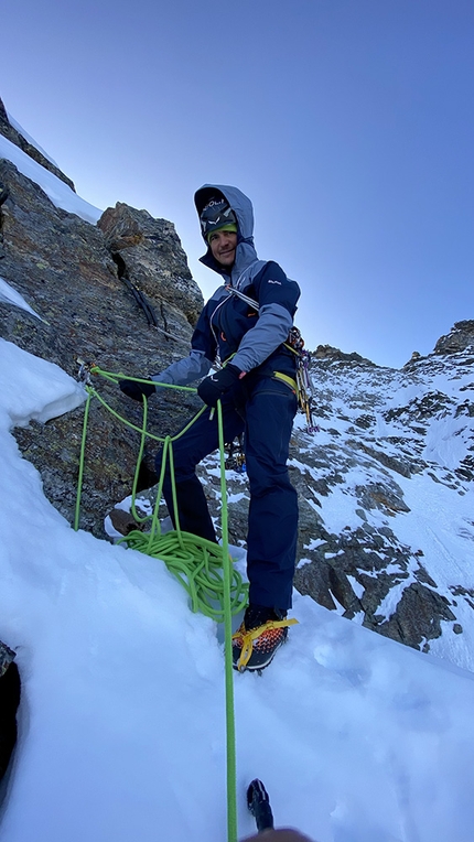 Wasserkopf, Rieserferner Group, Simon Gietl, Davide Prandini - Simon Gietl at a belay during the first ascent Aquädukt (IV, M5 650m) on Wasserkopf, Rieserferner Group, Italy (07/11/2020)