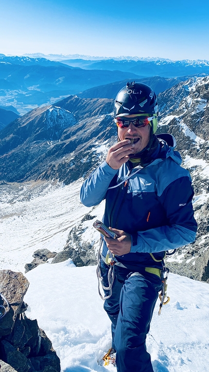 Wasserkopf, Rieserferner Group, Simon Gietl, Davide Prandini - Simon Gietl enjoying a rest on Aquädukt (IV, M5 650m) on Wasserkopf, Rieserferner Group, Italy (07/11/2020)