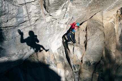 Federica Mingolla, Valle Orco, Caporal - Federica Mingolla and the shadow of Federico Ravassard during the first free ascent of Angels and Demons on Caporal in Valle dell'Orco