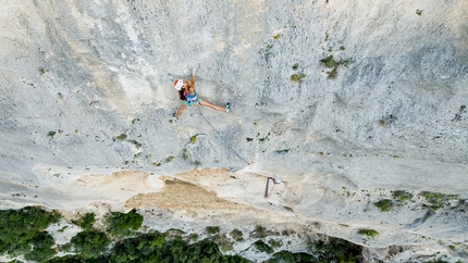 Wafaa Amer climbing at Finale Ligure - Wafaa Amer climbing up Bric Pianarella, Finale Ligure, while filming the Petzl Legend Tour Italia